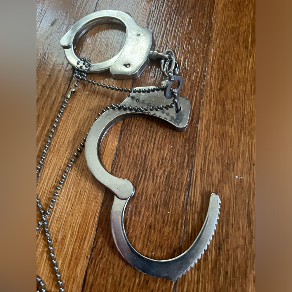Vintage police handcuffs with key